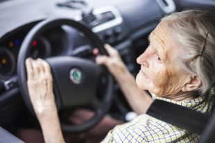 Senior,Woman,Driving,A,Car
